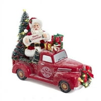 in. Fabriche sa baterije Santa u kamionu sa drvećem i poklonima